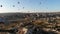 Hot Air Balloons Flying Over Hoodoos and Fairy Chimneys in Goreme Valley Cappadocia, Urgup Turkey