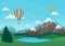 Hot air balloons flying over snowy mountains, lake, green meadows, spruce forest with clouds and blue sky in the background.
