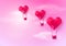 Hot air balloons Heart shaped flying on pink sky background.