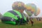 Hot air balloons in mist. Balloons Over Waikato festival