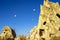 Hot air balloons overhanging the ancient dwellings of the magical Cappadocia, Turkey