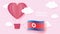 Hot air balloons in shape of heart flying in clouds with national flag of North Korea. Paper art and cut, origami style with love