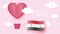 Hot air balloons in shape of heart flying in clouds with national flag of Syria. Paper art and cut, origami style with love to