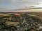 Hot air balloons in the sky of Walloon over beautiful farmland landscape