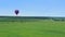Hot air balloons smooth aerial view pov. Flying over suburb, neighborhood