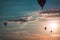 Hot air balloons soaring through the air at sunset at an airshow in Battle Creek Michigan