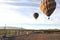 Hot Air Balloons Soaring over roadways