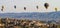 Hot air balloons at sunrise flying over Cappadocia, Turkey