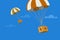 Hot air balloons transporting money boxes in the sky.
