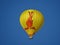 A hot air tourist balloon moving gently across the sky in tropical Queensland