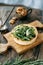 Hot appetizer with mushrooms, chicken and herbs. Tartlet made of yeast-free dough close-up