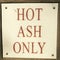 HOT ASH ONLY - A sign in Michigan warns people grilling out that you can only throw away hot ash