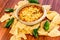 Hot bean dip with jalapenos, sour cream and melted cheddar chees