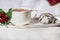 Hot beverage with delicious chocolate crinkle biscuits on a white background, isolated, close up