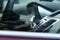 Hot car interior. Passenger car dashboard view through the side window. Reflections in the glass