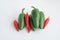 Hot chilli peppers on white background