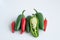 Hot chilli peppers on white background