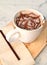 Hot chocolate on chopping board