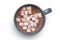 Hot chocolate with small pink and white marshmallows in a blue-grey ceramic mug isolated on white from above