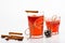 Hot cider concept. Traditional mulled wine with spices. Glasses with mulled wine or cider tied with twine string on