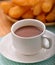 Hot cocoa with deep fried dough stick for breskfast