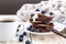 Hot coffee and buckwheat chocolate pancakes with blueberries