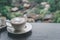 Hot coffee mug,Glass with sugar Coffee flavoring on wood table and Nature view in Rural village and Mountain