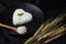 Hot cook jasmine rice on spoon serve with smoke.rice heart shape