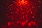 Hot and dark defocused red lights for Valentine`s day background. Red bokeh and red background