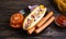 Hot dog gourmet picnic a wooden background traditional sauce ingredients