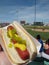 Hot dog loaded at ballpark