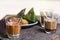 hot drink thai milk tea, black coffee, cocoa signature local street beverage serve with dessert on wooden table