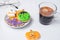 Hot espresso coffee  or chocolate cup with funny Halloween Cookies. Happy Halloween day, Trick or Threat, Hello October, fall