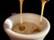 Hot espresso coffee flow to a cup on espresso machine, espresso brew from arabica