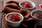 Hot festive French dessert. Chocolate pudding in Ceramic Bakeware with cheery. top view