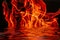 Hot fire flames in water as nature element and abstract background