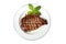 Hot fresh grilled boneless rib eye steak isolated on white with barbecue grill marks in the meat