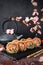 Hot fried Sushi Roll with salmon, shrimp, onion, avocado and cheese. Sushi menu.