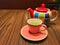 Hot green tea with cute ceramic pot for drink