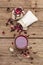 Hot hibiscus tea. Dry petals, linen sacks. Healthy food and self-care concept. Old wooden boards backgrounds