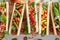 Hot and homemade hot dogs as appetizers for summer party