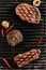 Hot Juicy Ribeye Steak on Barbecue Grill Background