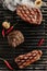 Hot Juicy Ribeye Steak on Barbecue Grill Background