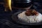 Hot letcho with rice on dark background