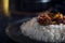 Hot letcho with rice on dark background