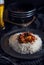 Hot letcho with rice on dark background