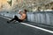 Hot Man Pouring Refreshing Water Over Face After Exercising Outdoors