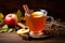 Hot mulled apple cider with with cinnamon sticks, cloves and anise