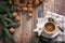 Hot nutty cappuccino with caramel and gingerbread Christmas cookies on a rustic table. Homemade sweet pastries. Top view. Copy