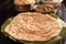 Hot Parotta on banana leaf with biryani ,Paneer Butter Masala and fried rice.